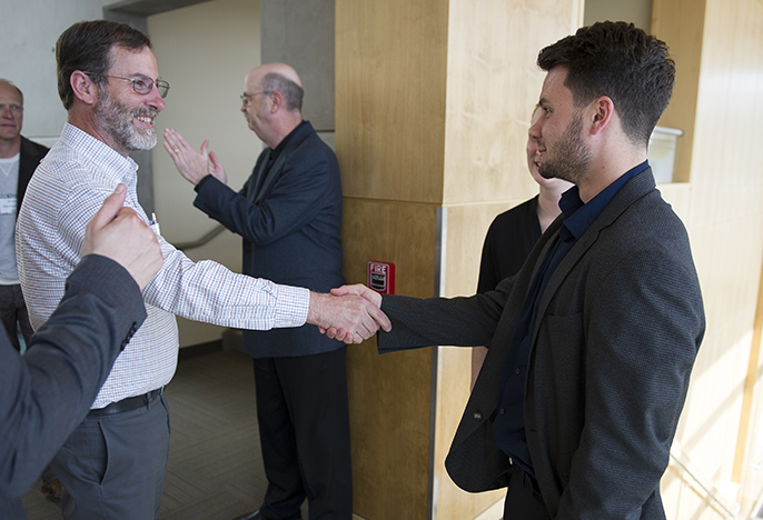 two men shaking hands