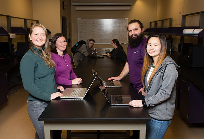 Students working around table